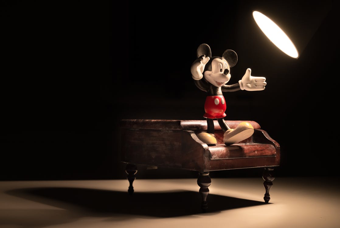 Disney Takes over fox Mickey Mouse stands on piano