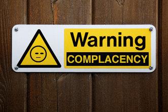 Warning complacency sign