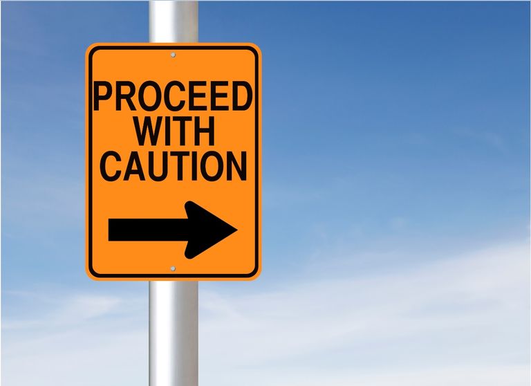 Proceed with caution sign for stock option